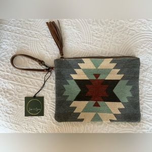 Myra wristlet non removable strap.